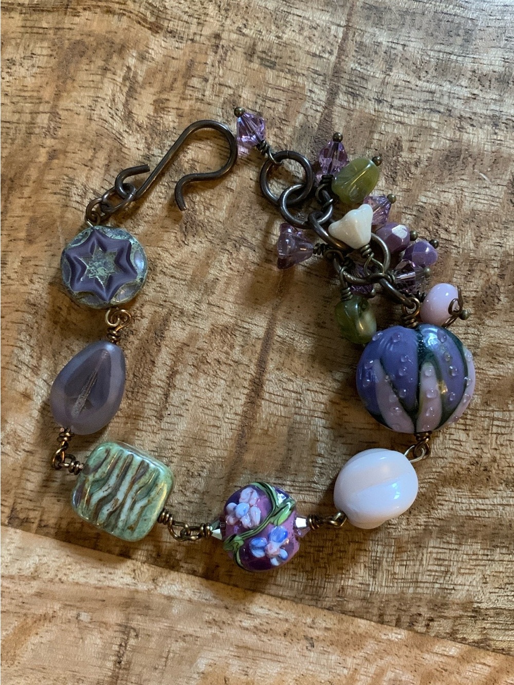 Handcrafted Artisan Charm Bracelet with Lampwork Floral Glass Beads